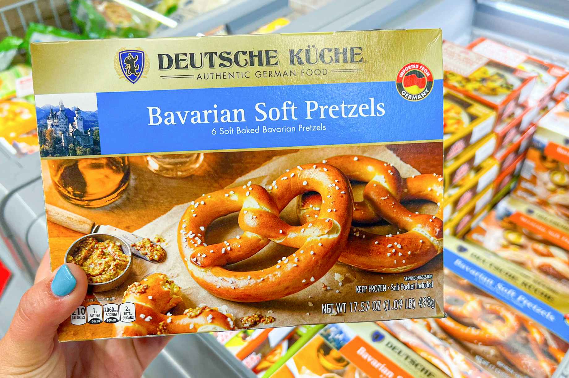 Someone holding a box of Bavarian soft pretzels at Aldi