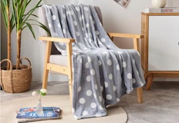 These $10.99 Fleece Blankets at The Home Depot Are Surprisingly Luxurious card image