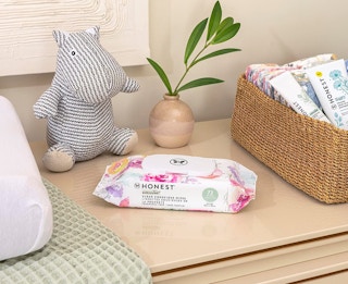 Honest wipes package on a wooden table