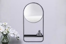 Lifestyle image of the round farmhouse style mirror shelf from the brand Storied Home at The Home Depot