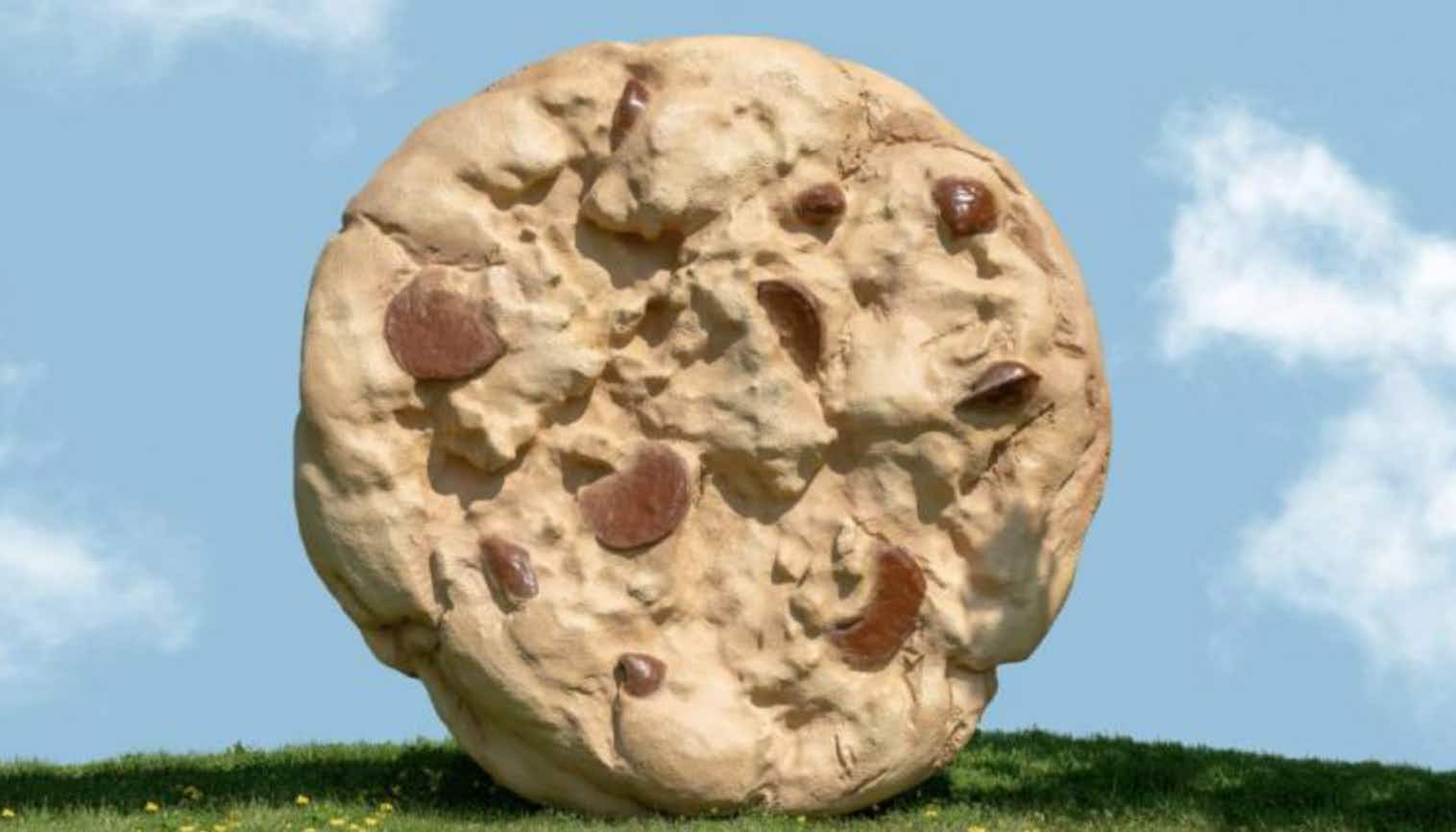 a giant cookie statue from Crumbl Cookies