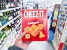 hand holding cheez its in walgreens
