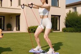 a woman using a twist board outside