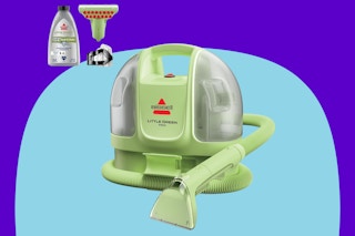 BISSELL Little Green Mini Portable Carpet and Upholstery Deep Cleaner on a blue background.