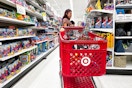 a woman shopping with a target cart 