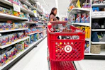 a woman shopping with a target cart 
