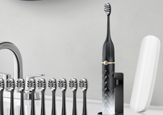 an electric toothbrush with refill brush heads