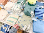 toddler shirts sitting on a target shelf