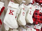 Letter Christmas Stockings displayed to spell out KCL in stores at Target