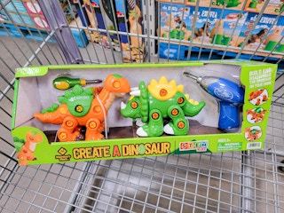 create a dinosaur toy in a cart, includes 2 dinosaurs and a drill toy