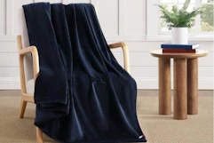 Tommy Hilfiger blanket draped over chair