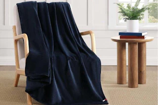 Tommy Hilfiger blanket draped over chair