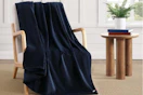 Tommy Hilfiger blanket draped over chair