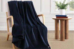 Tommy Hilfiger blanket draped over chair