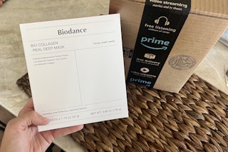 Person holding Biodance Face Masks in front of Prime box