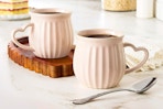 Lifestyle image of the The Pioneer Woman Colette Heart Mug Set in a kitchen setting