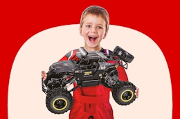 Stock image of a child holding the Wisairt remote control truck