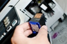 Printer cartridge being removed from a printer