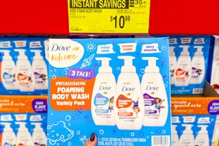 hand holding a dove body wash 3 pack