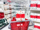 target holiday sheet sets sitting on shelves and a cart