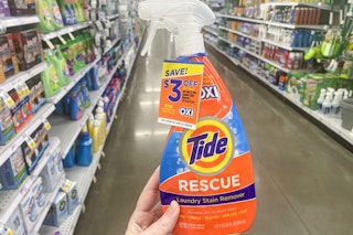 hand holding meijer tide rescue laundry stain remover at meijer