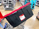 red and black 27-gallon storage tote in a Walmart cart