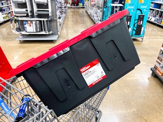red and black 27-gallon storage tote in a Walmart cart