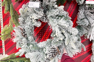 holiday wreaths sitting on a target shelf