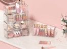 clear stackable drawers with makeup in a pink room