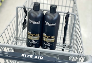 two bottles of tresemme shampoo in rite aid shopping cart