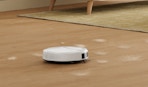 a robot vacuum on hardwood floors