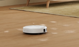 a robot vacuum on hardwood floors
