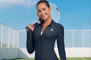 a woman wearing a cropped jacket