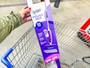 hand holding up a Swiffer Power Mop at Walmart