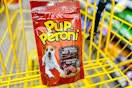 pup-peroni dog treats in a yellow shopping cart