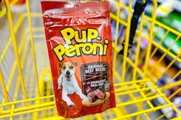pup-peroni dog treats in a yellow shopping cart