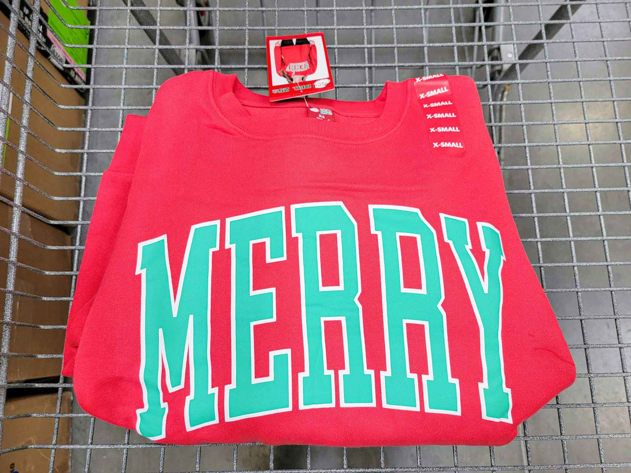 red sweatshirt that says "merry"