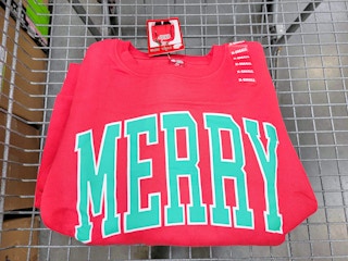 red sweatshirt that says "merry"
