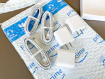 chargers and charging cords on an Amazon mailer