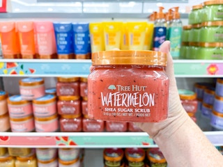 tree hut sugar scrub being held