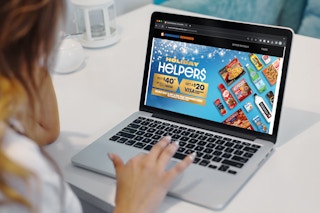 someone looking at the NestleRewards website offer for visa gift cards