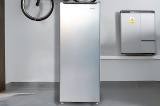 Lifestyle image if Frigidaire Upright Freezer in garage setting