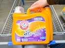 Arm & Hammer (Oxi Clean) laundry detergent (160 loads) held over Walmart shopping cart