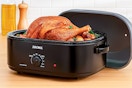 Lifestyle image created by ChatGPT of the Aroma Roaster Oven in kitchen setting roasting a whole turkey/chicken