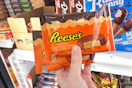 hand holding good humor reese's ice cream bars