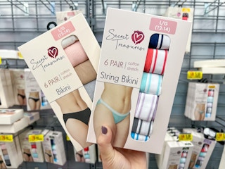 hand holding secret treasures 6 pack bikini panties at walmart