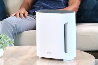 PureZone 3-in-1 True HEPA Air Purifier sitting on a table