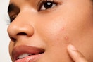 someone with a mighty patch pimple patch on their face 