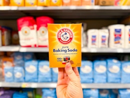 Arm & Hammer Baking Soda held up in baking aisle at Walmart