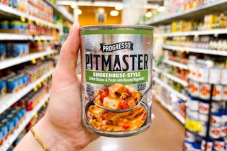 hand holding a can of progresso pitmaster soup